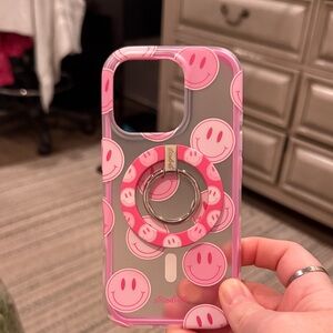 Bubblegum smiley iPhone 16 pro MagSafe case with matching MagSafe ring.